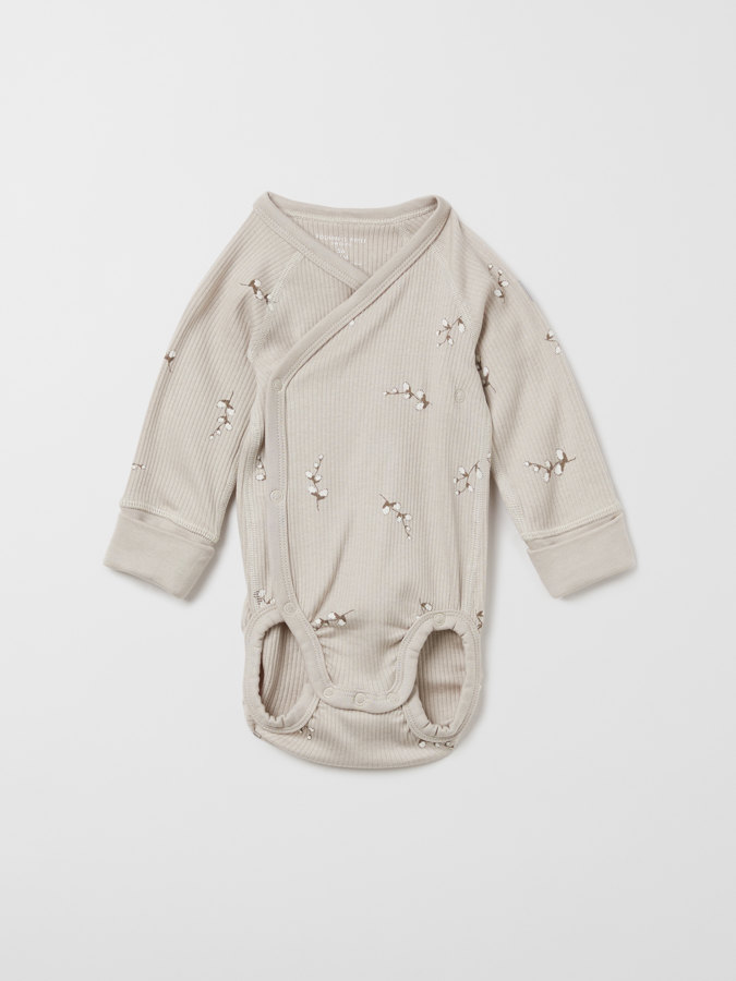 Verlängerbarer, gerippter Body mit Blumenzweigen Verlängerbarer, gerippter Body mit Blumenzweigen