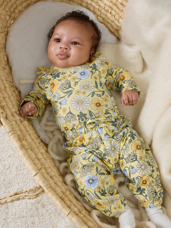 Body mit Rüschen, Blumenmotiv Body mit Rüschen, Blumenmotiv